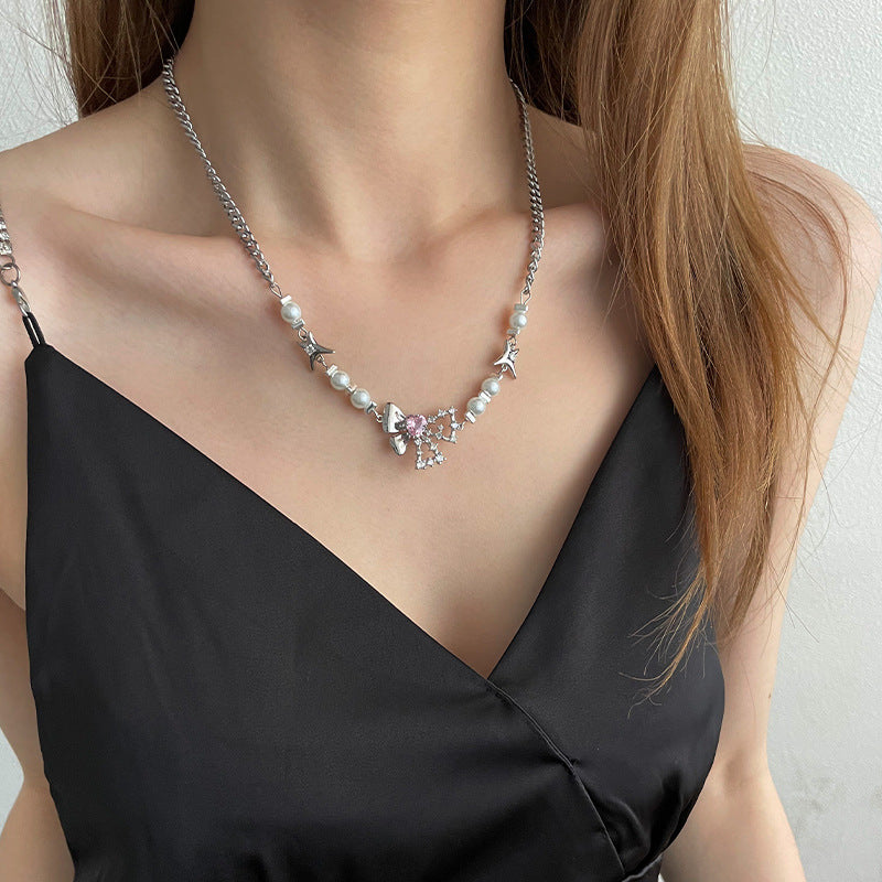 Pearl Bow Love Necklace – Elegant Stitch Detail Pendant for Women