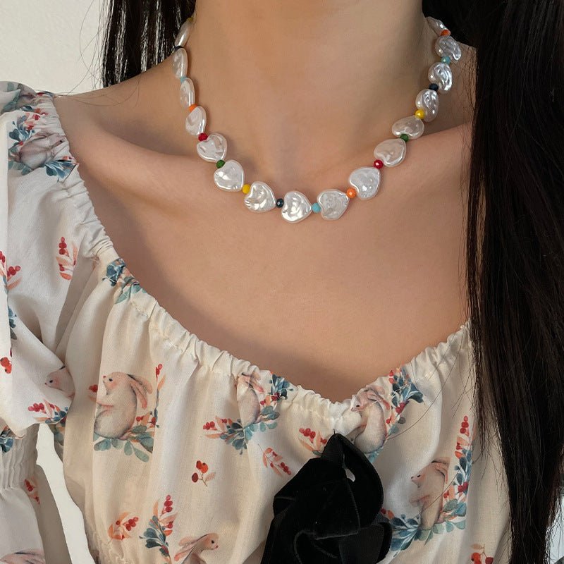 0d4ecb51-cac6-48a2-ae29-02037379e662 Colorful Beaded Pearl Love Necklace – Elegant Statement Chain for Women