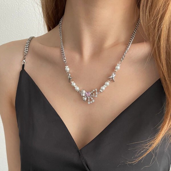 Pearl Bow Love Necklace – Elegant Stitch Detail Pendant for Women